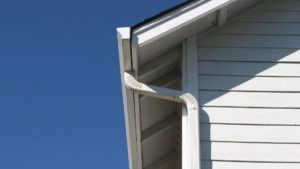 Seamless aluminum gutters and downspouts