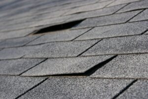 Shingles detaching from a roof